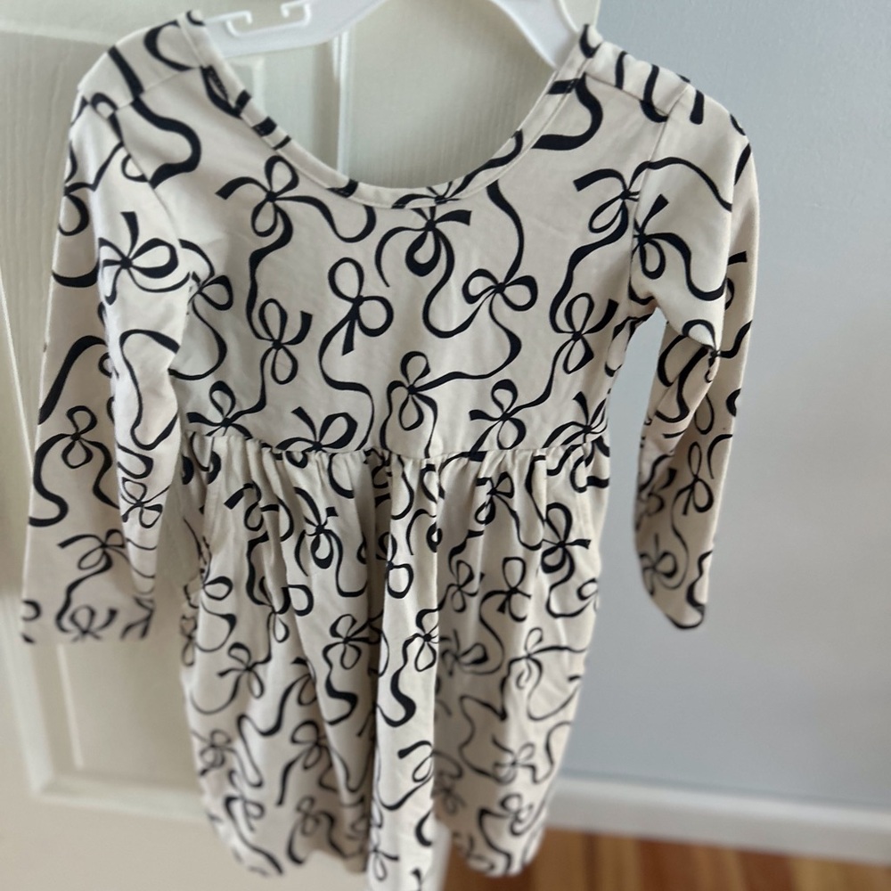 Hanna Andersson Cream and Black Bow Pattern Dress